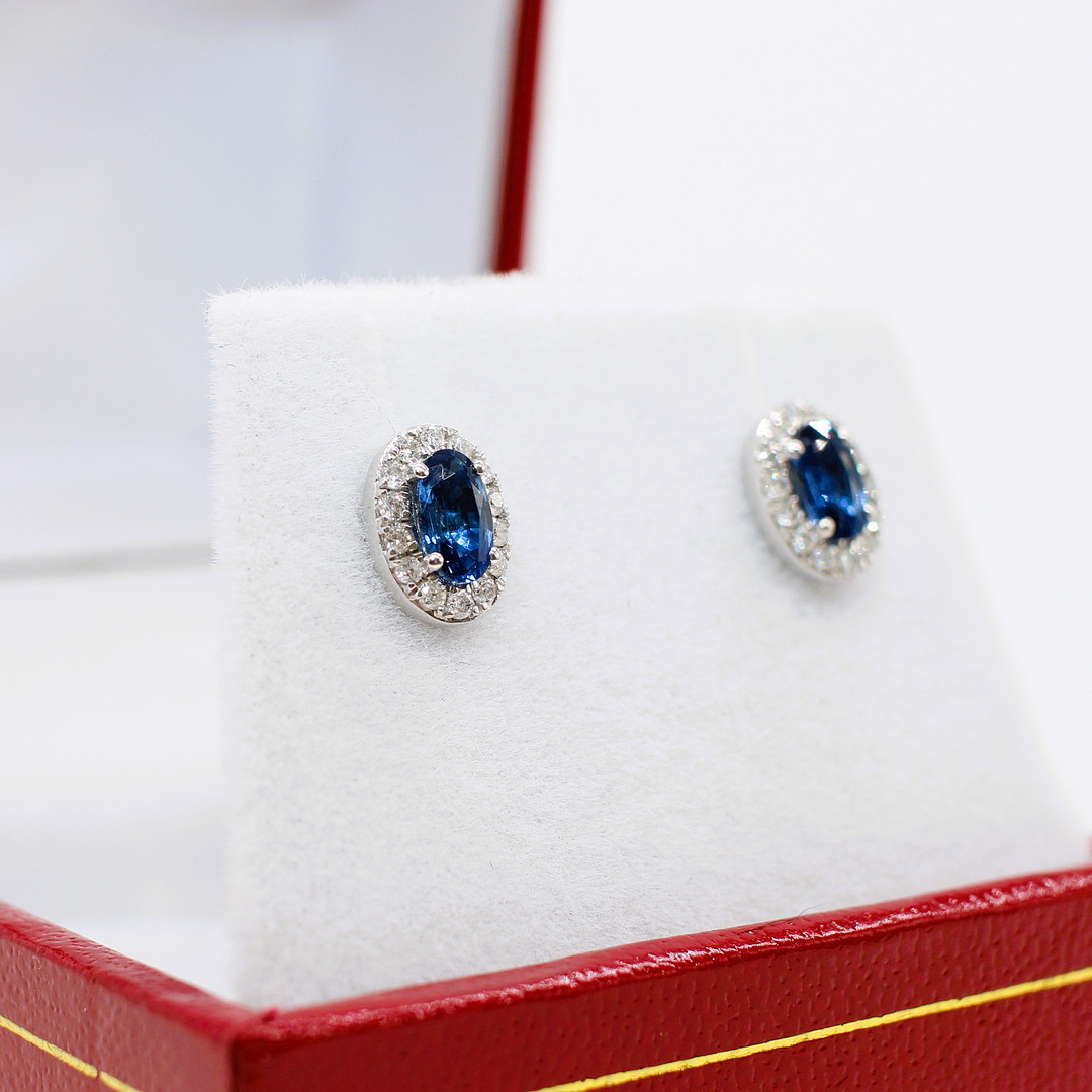 SAPPHIRE & DIAMOND CLUSTER EAR STUDS.