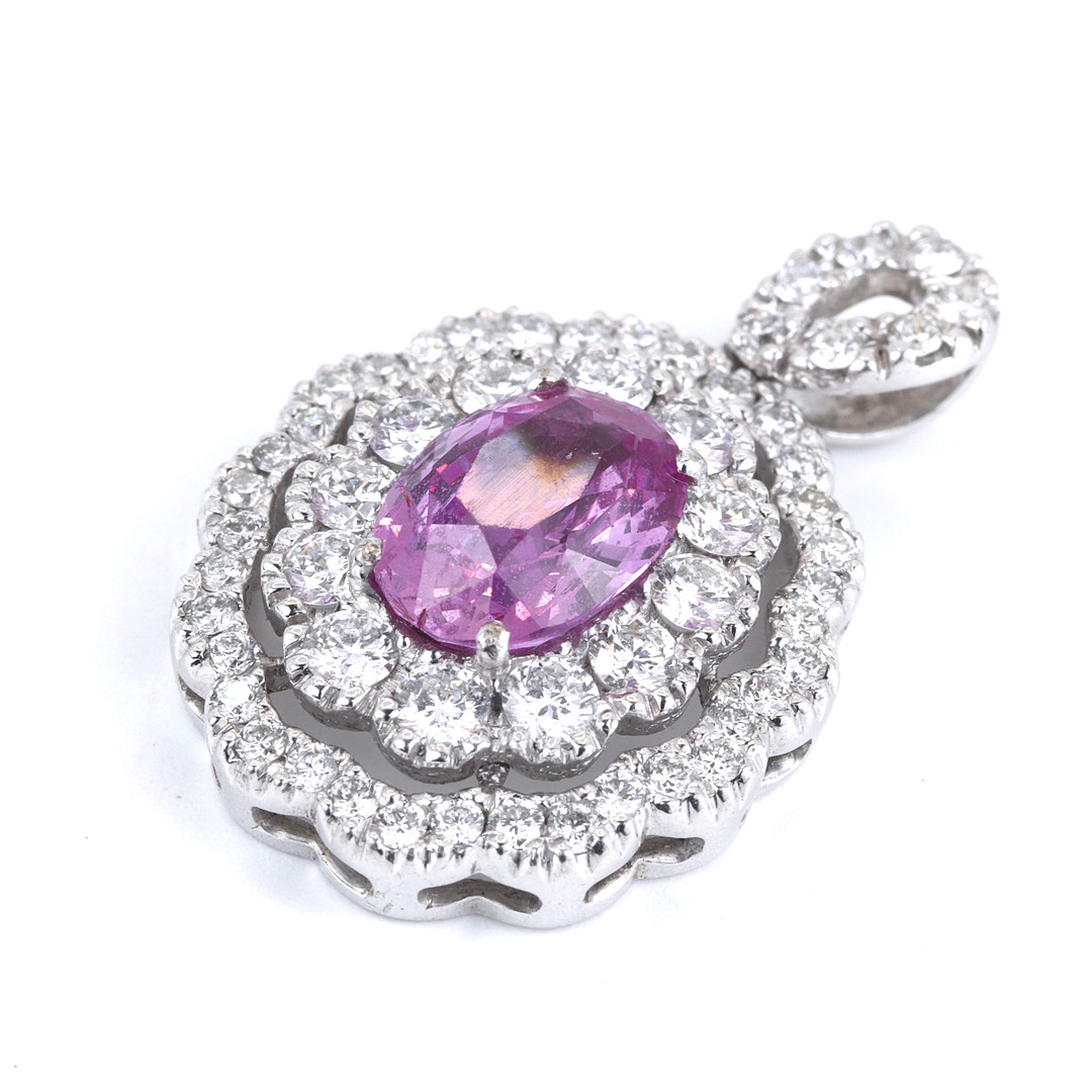 18CT WHITE GOLD PINK SAPPHIRE & DIAMOND SET PENDANT.