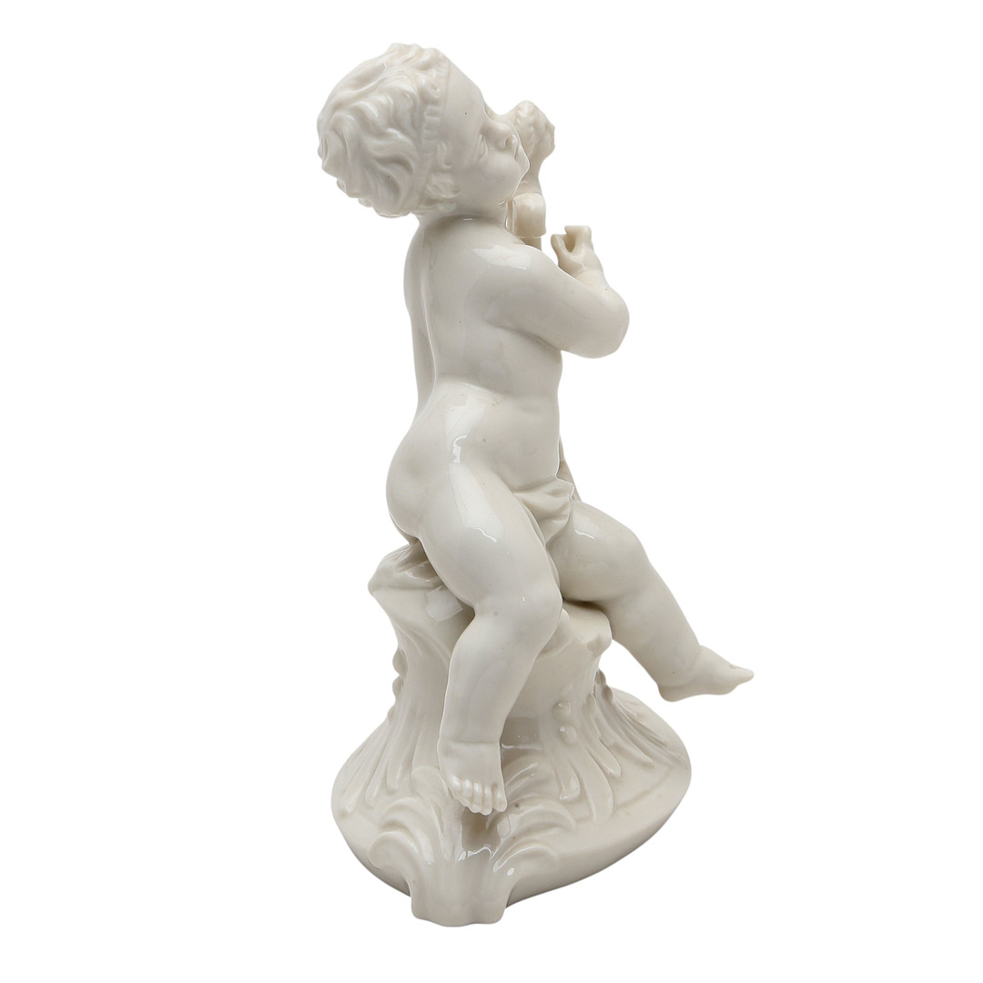 "Musician boy", glazed porcelain figure from Nymphenburg, 20th Century.