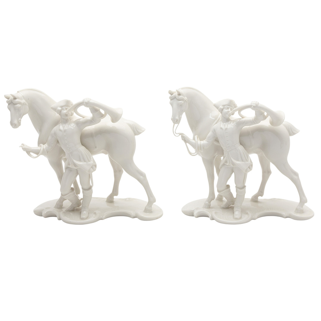 "Hunters", pair of Nymphenburg glazed porcelain figures, 20th Century.