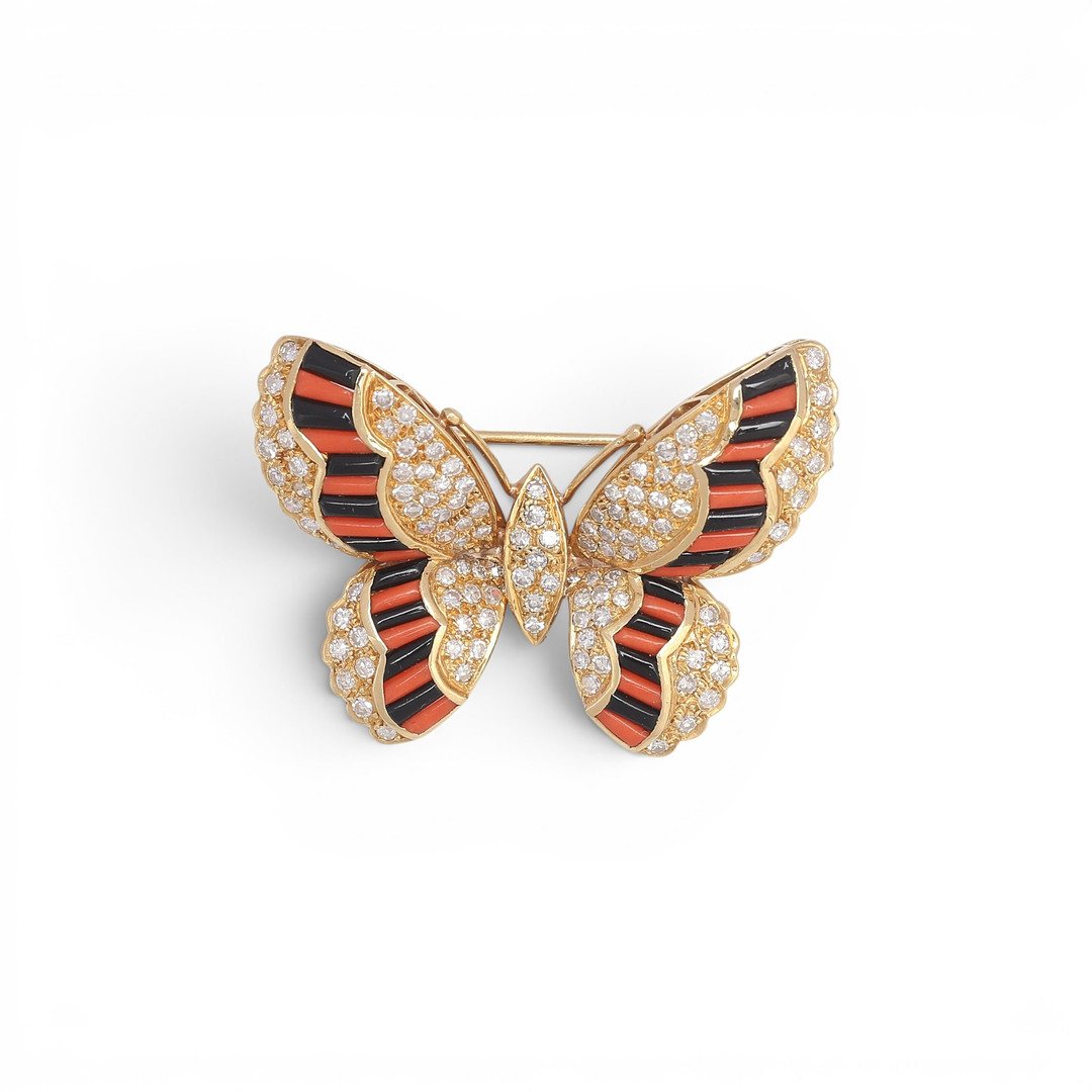 Butterfly-shaped brooch/pendant.