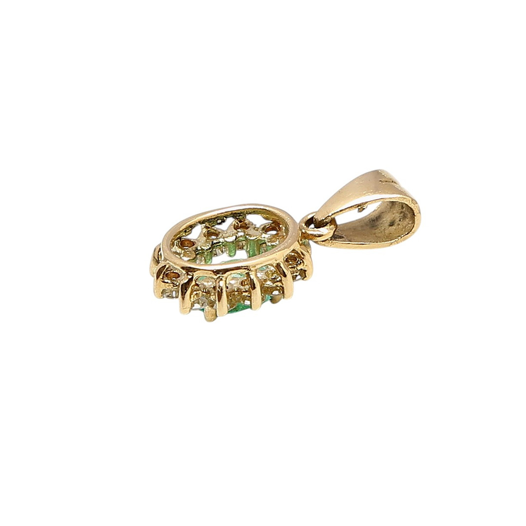 Emerald and diamonds rosette pendant.