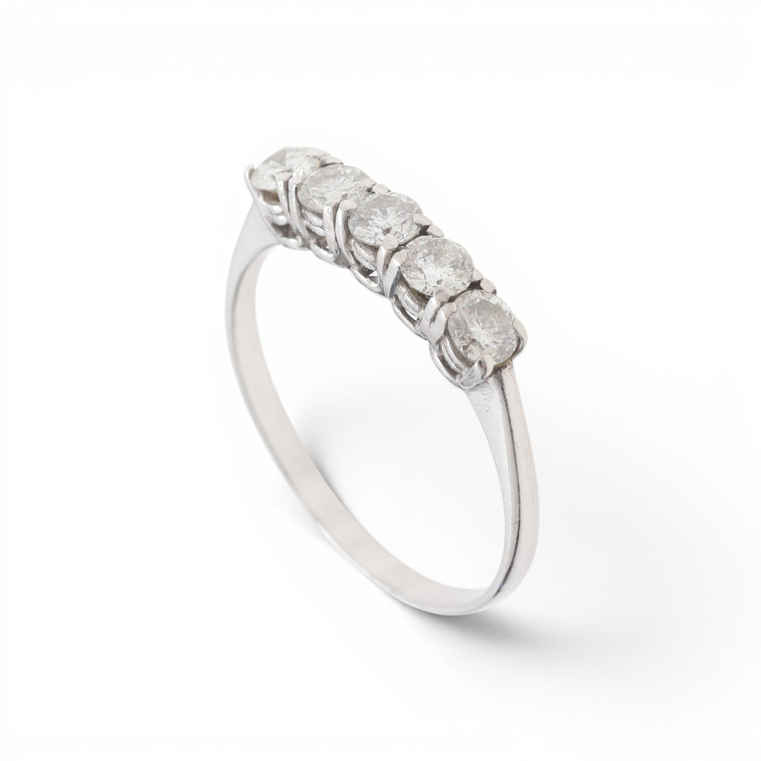 Diamonds half-band wedding ring.