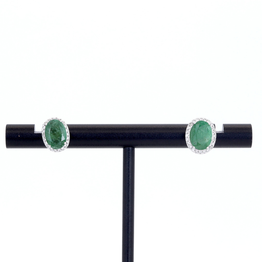 18CT EMERALD AND DIAMOND EARRINGS.