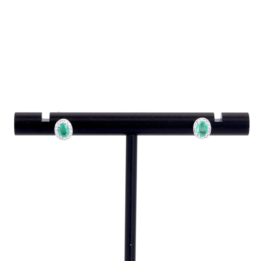 18CT EMERALD AND DIAMOND EARRINGS.