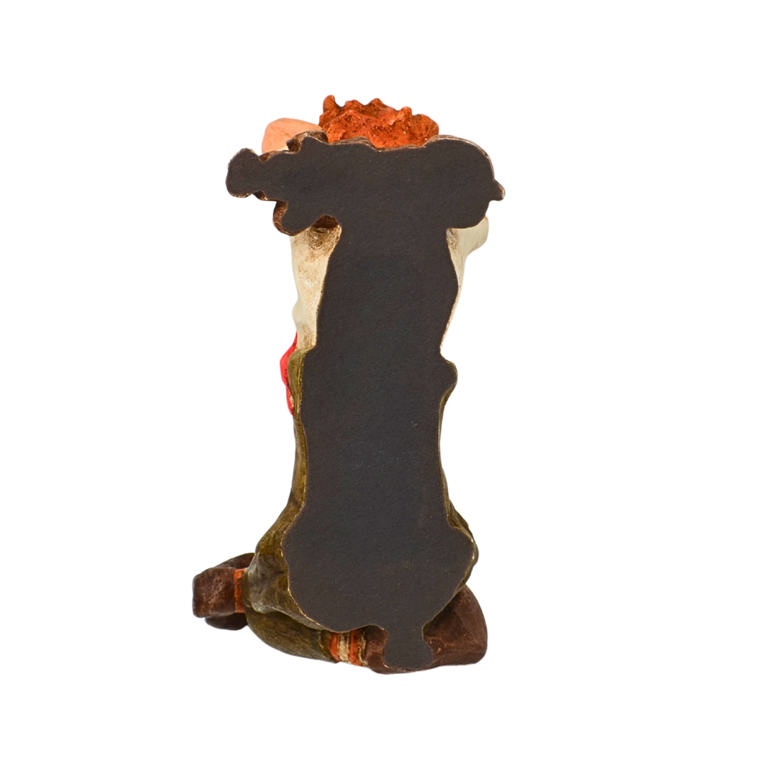 Dekorationsfigur – Liegender Clown mit Hund.