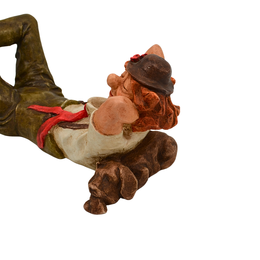 Dekorationsfigur – Liegender Clown mit Hund.