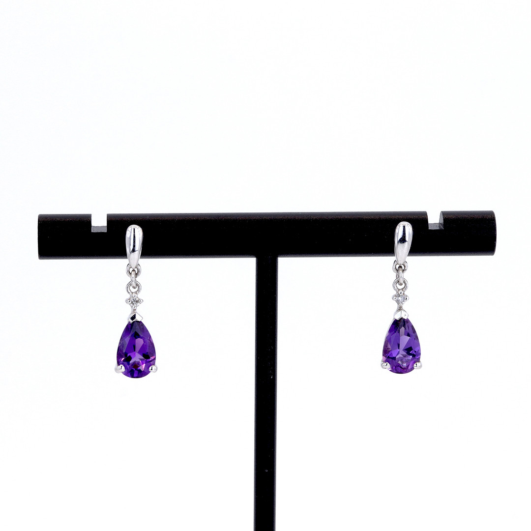 9CT AMETHYST AND DIAMOND EARRINGS.