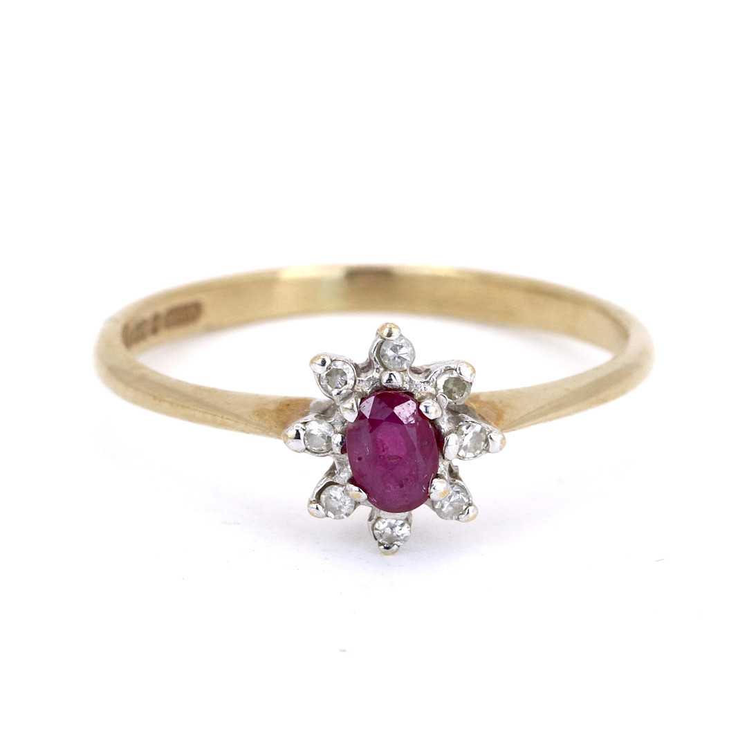 RUBY AND DIAMOND 9CT RING.