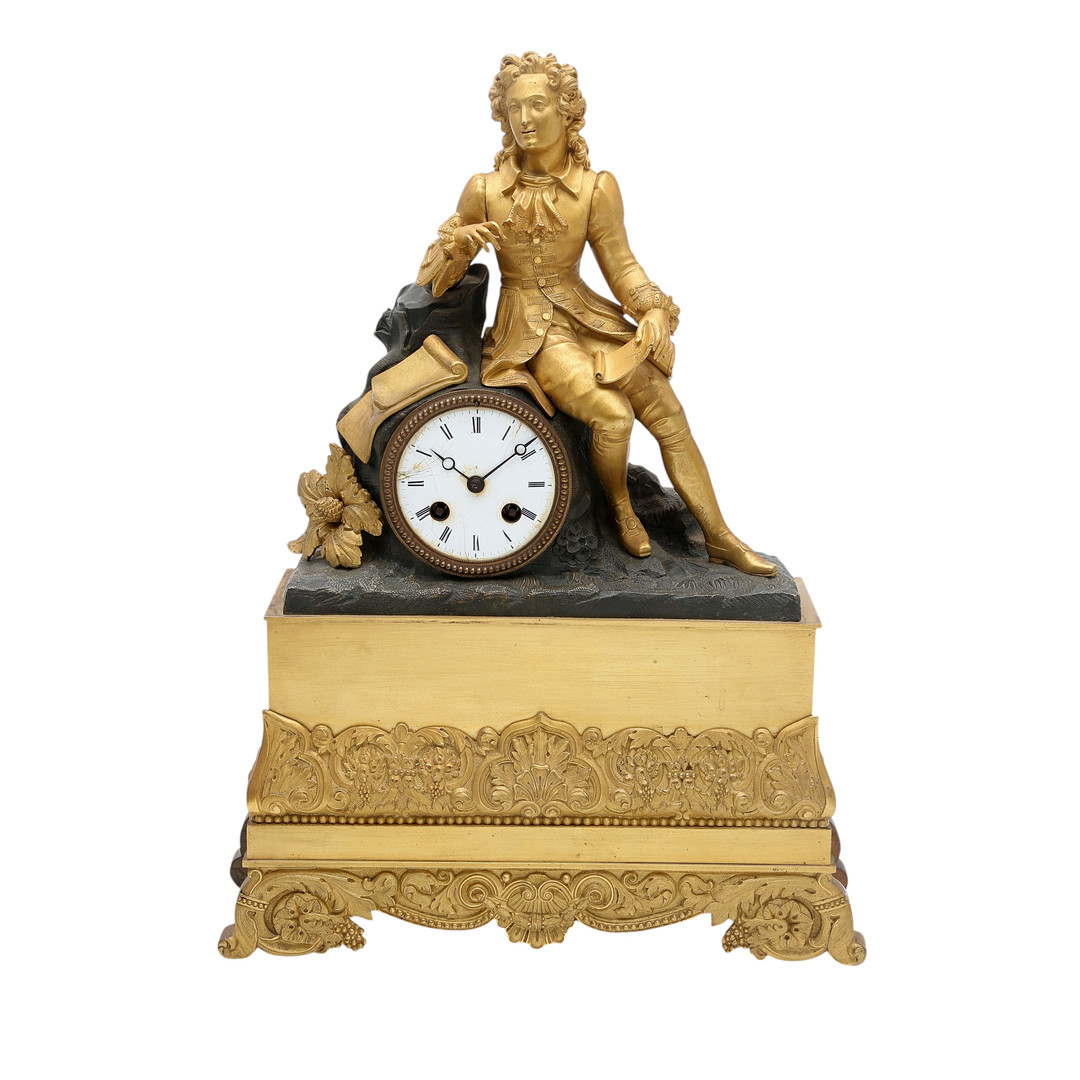 Restoration table clock in gilt and bluing bronze, circa 1830.