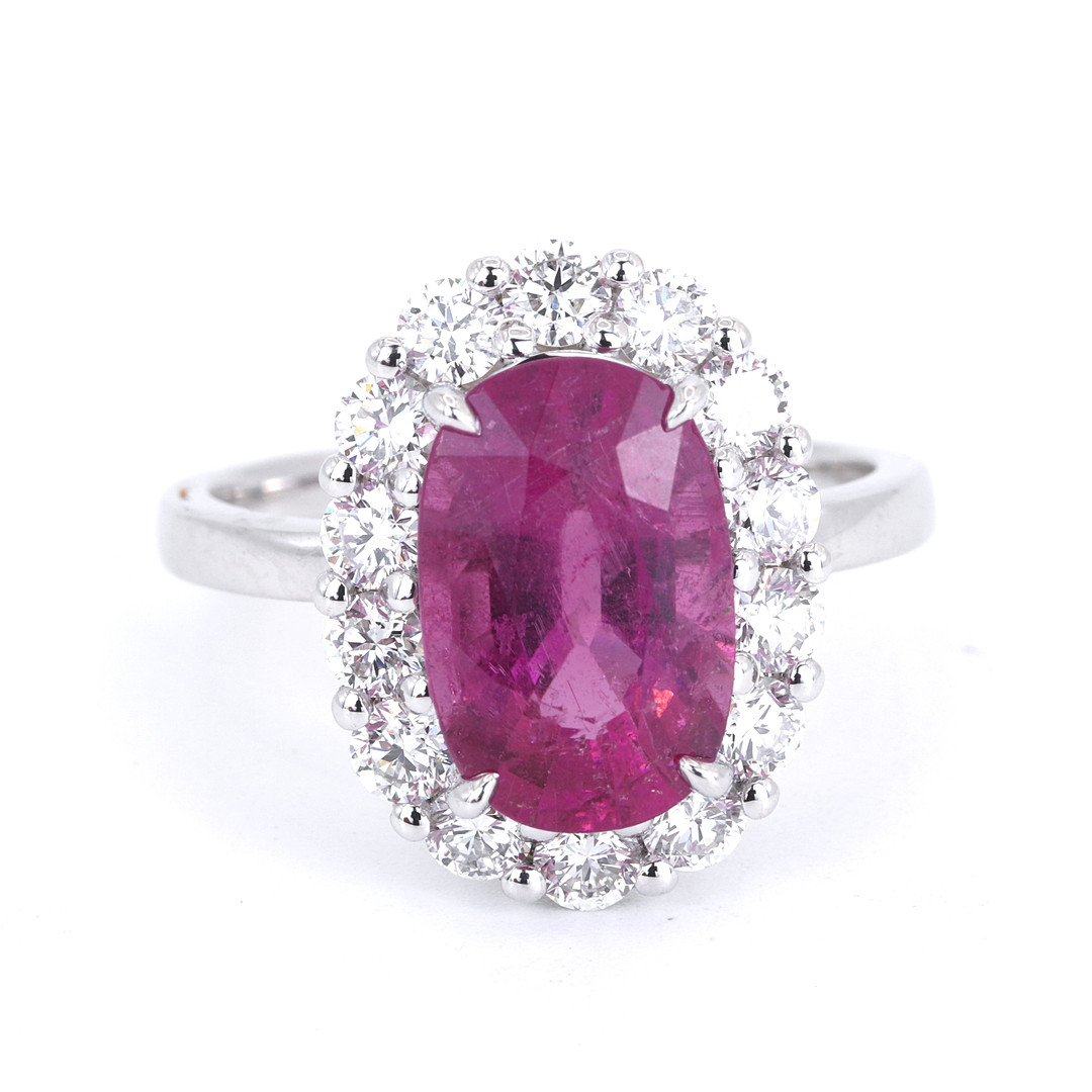 9CT TOURMALINE AND DIAMOND RING.