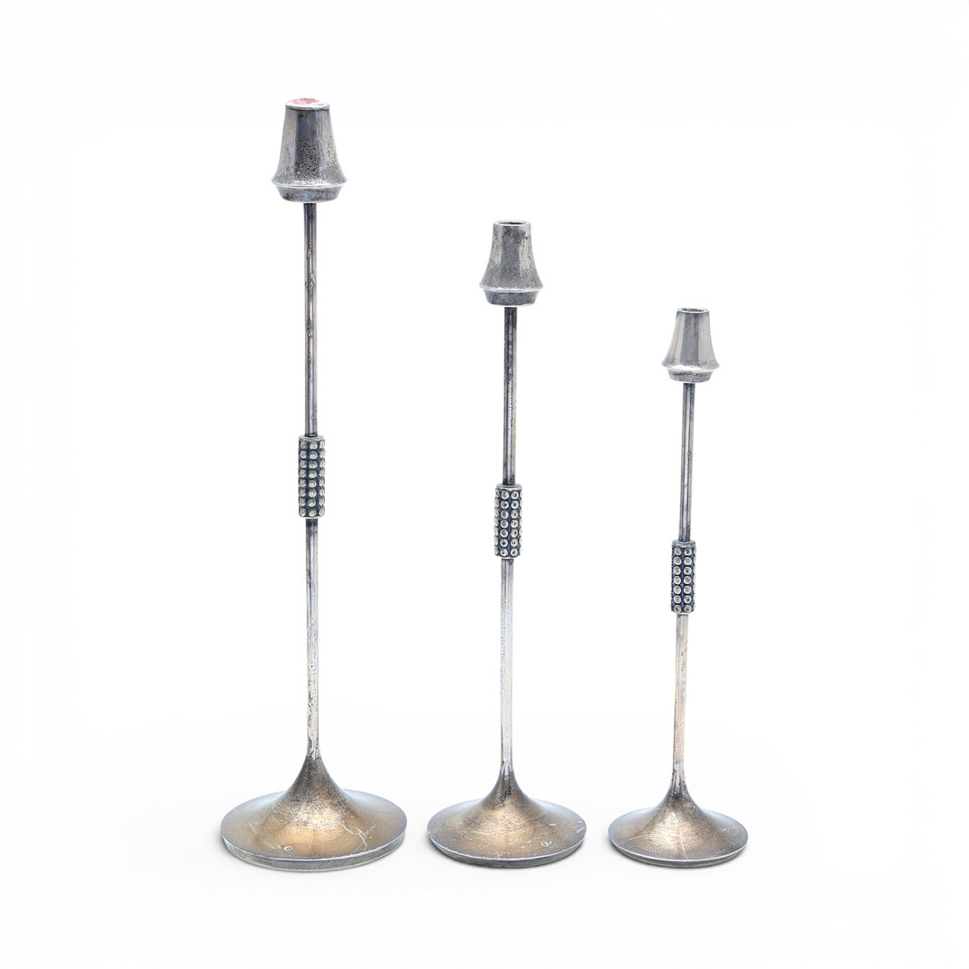 Set of three Spanish silver candlesticks, 20th Century.