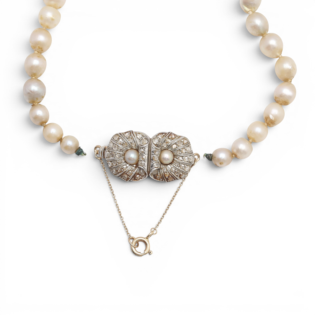Art Deco pearls choker with diamonds shell-style clasp, circa 1930.