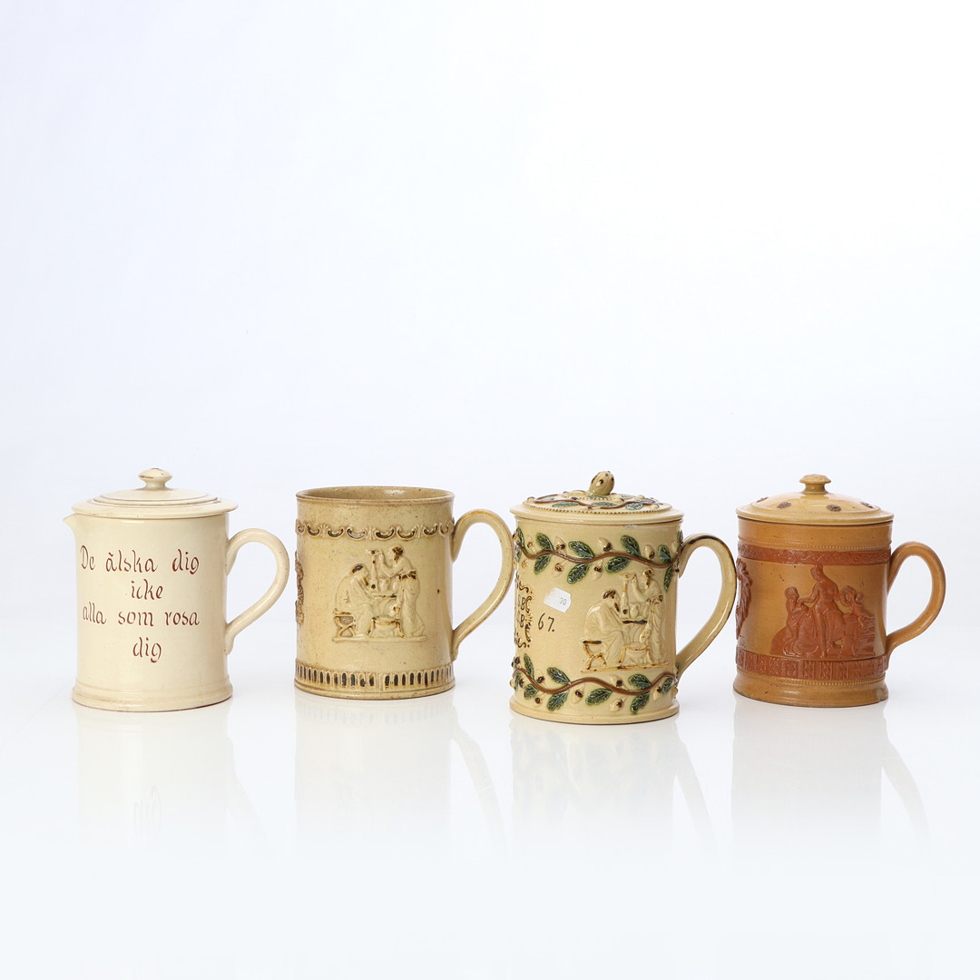 HÖGANÄS, MUGGAR, FYRA ST, MED TRE LOCK. Glaserad keramik, 18-1900-tal.