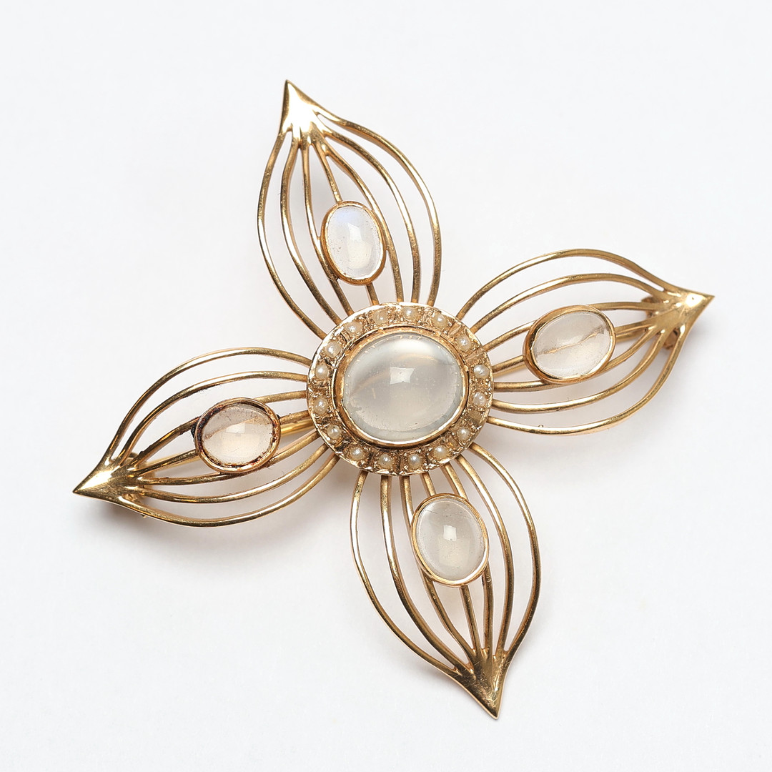 BROSCH. Brosch med stenar, 18k, totalvikt ca 10,85g.