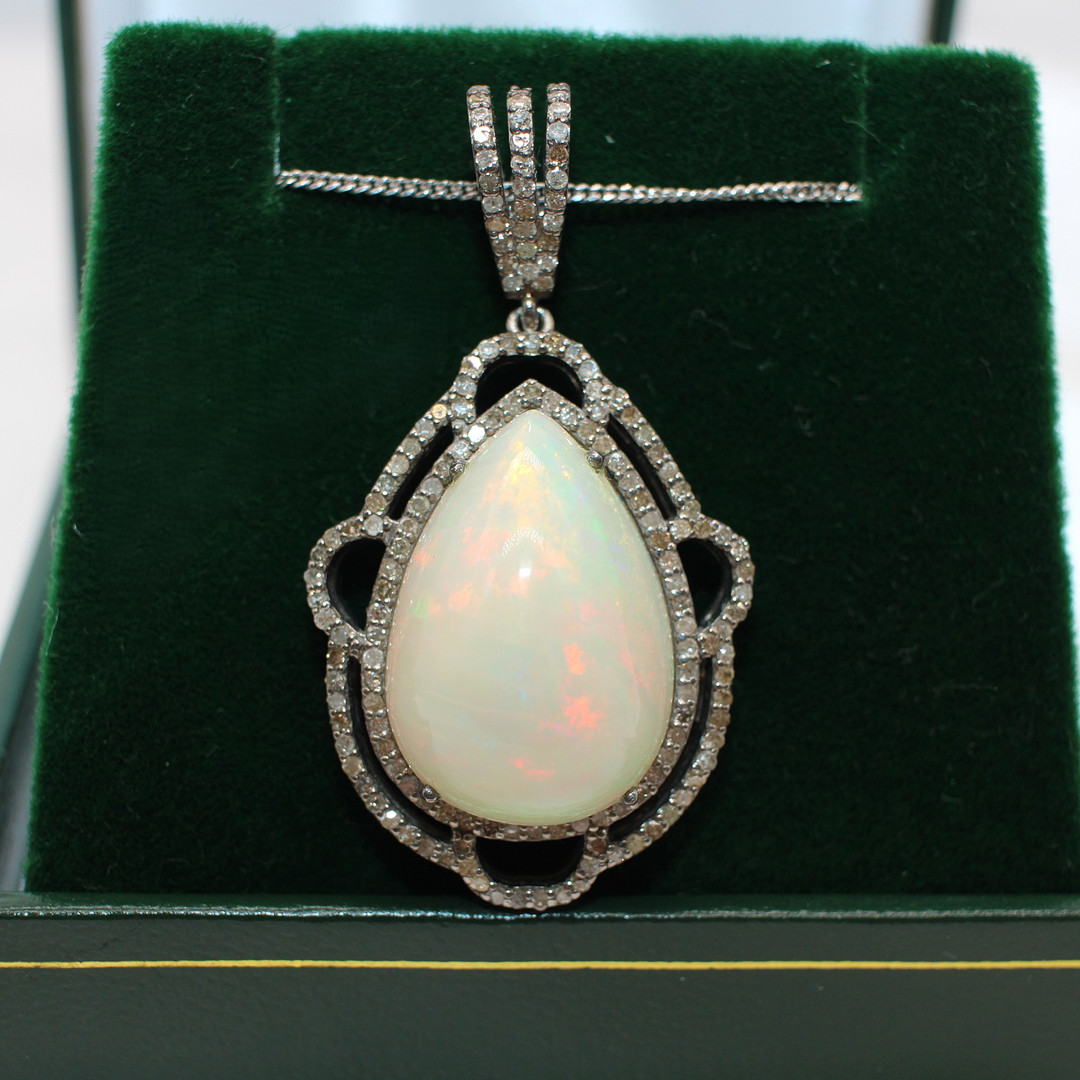 OPAL & DIAMOND PENDANT NECKLACE.
