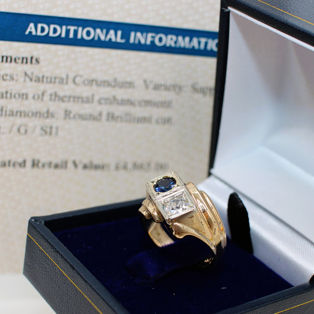 UNUSUAL CERTIFIED SAPPHIRE & DIAMOND RING.