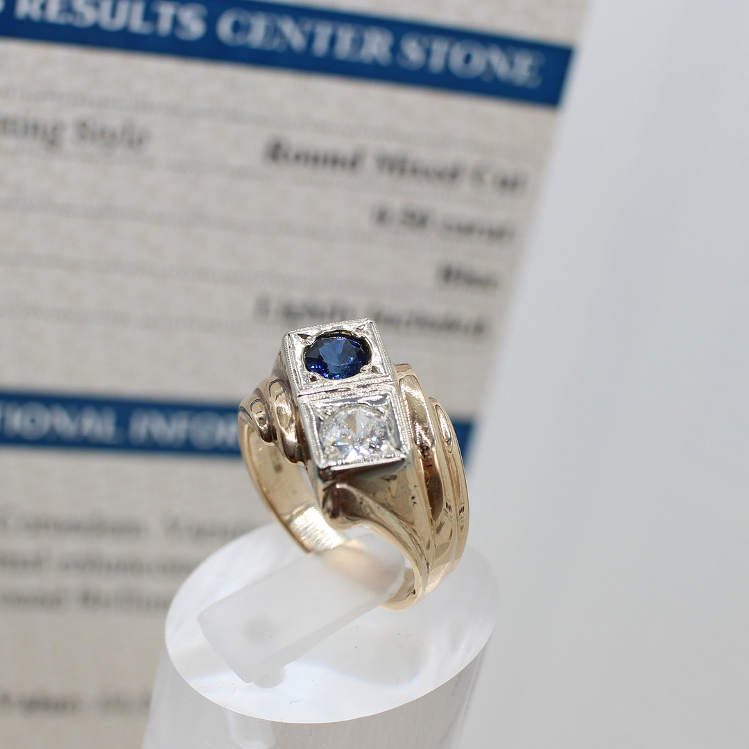 UNUSUAL CERTIFIED SAPPHIRE & DIAMOND RING.