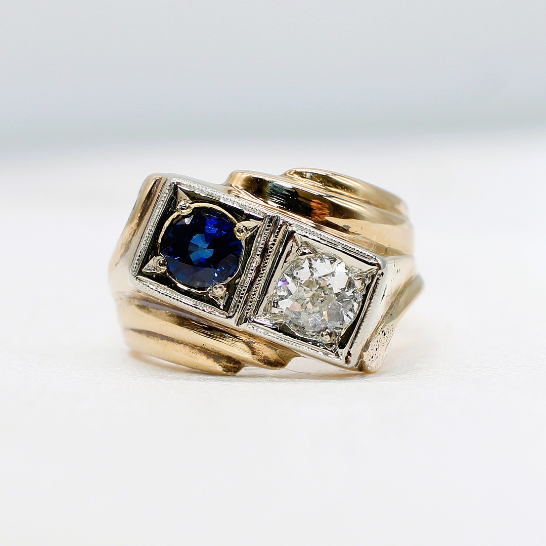 UNUSUAL CERTIFIED SAPPHIRE & DIAMOND RING.