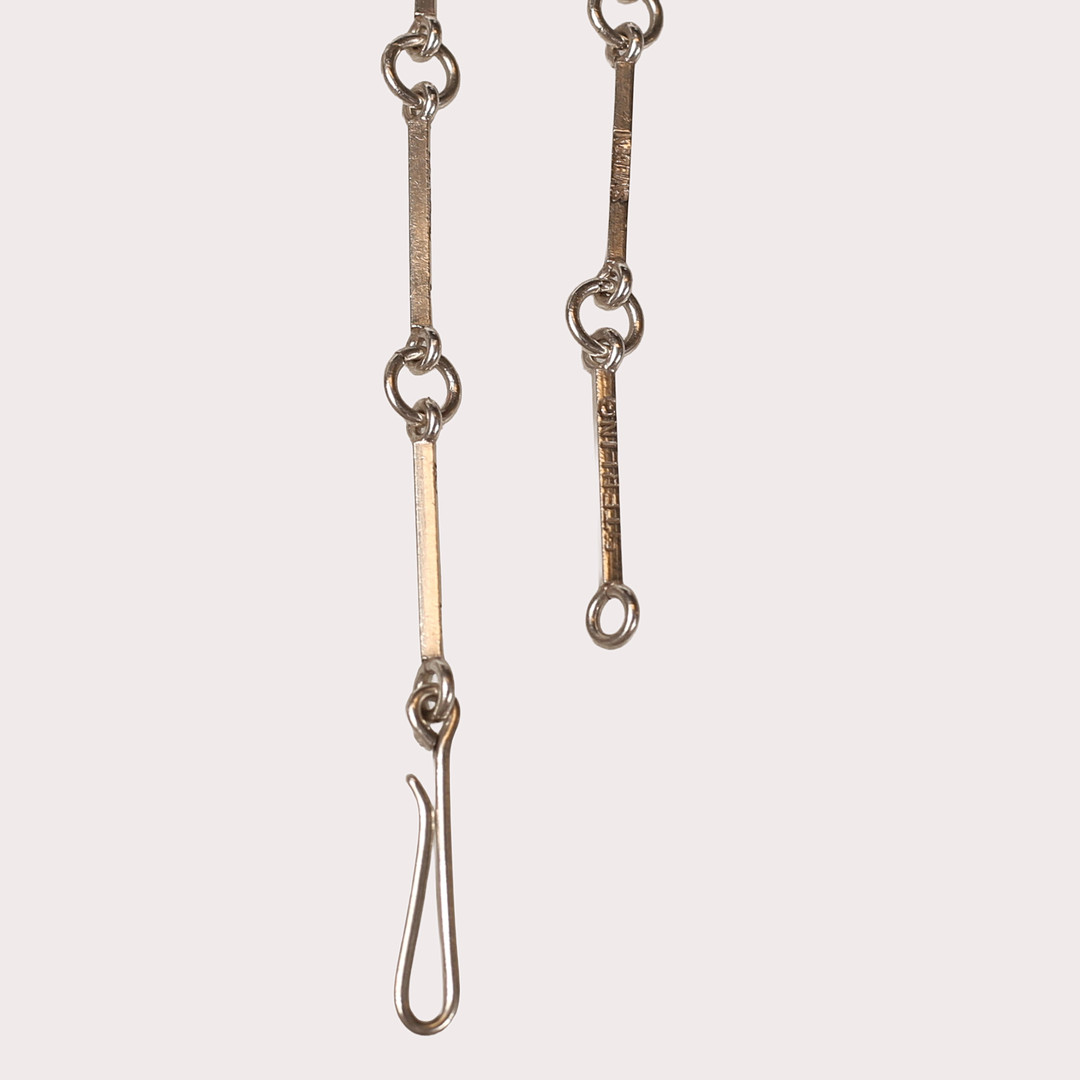 WIWEN NILSSON. Halssmycke, sterlingsilver, hänge med en kuddslipad bergkristall, Lund 1943.