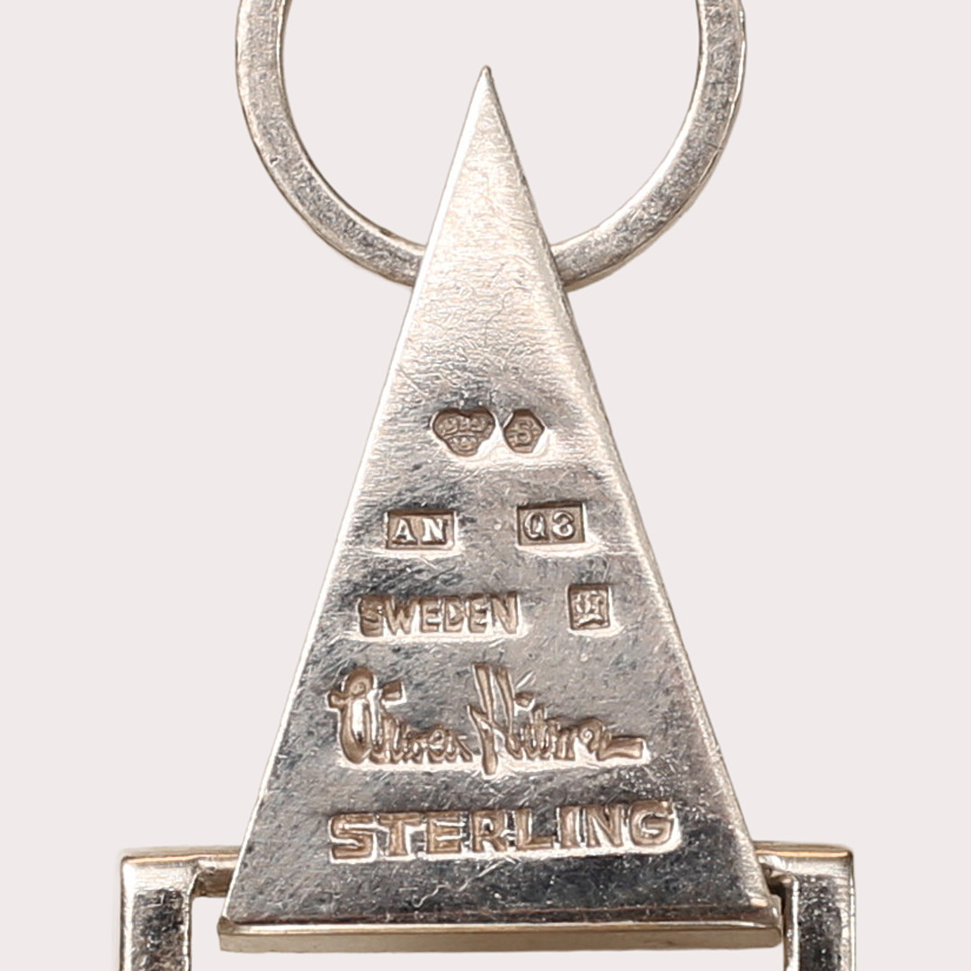 WIWEN NILSSON. Halssmycke, sterlingsilver, hänge med en kuddslipad bergkristall, Lund 1943.