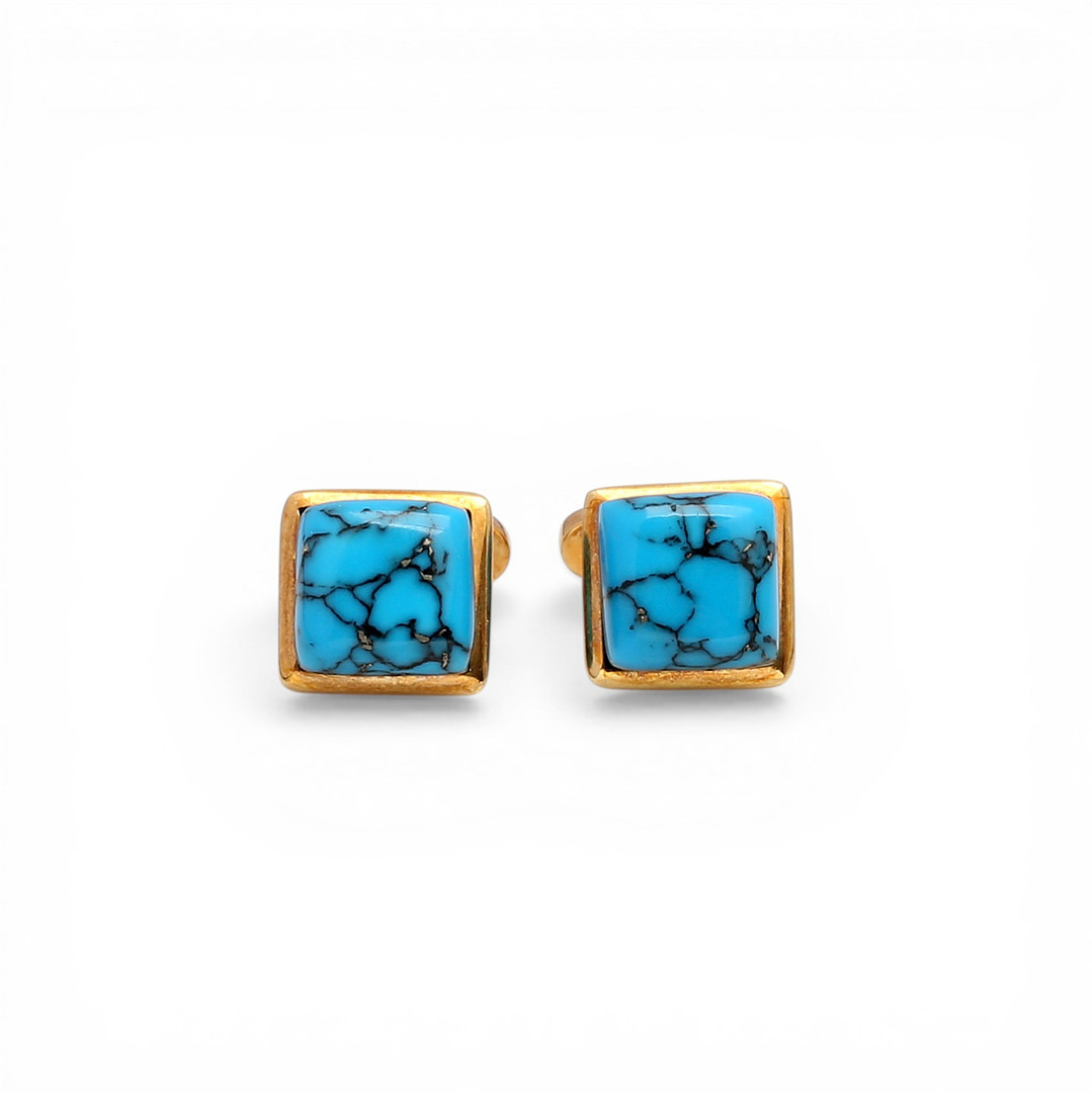 Gold and gemstones cufflinks.
