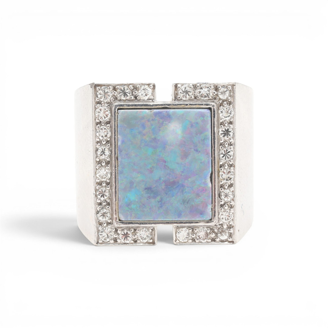ORIOL SUNYER. Opal and diamonds signet ring, circa 1970.