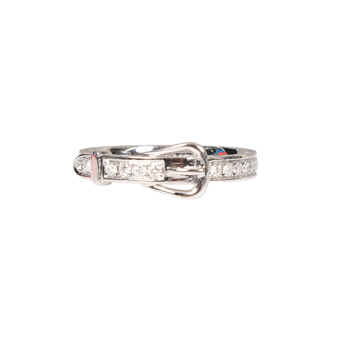 A HERMES 18 CARAT WHITE GOLD AND DIAMOND BUCKLE RING.