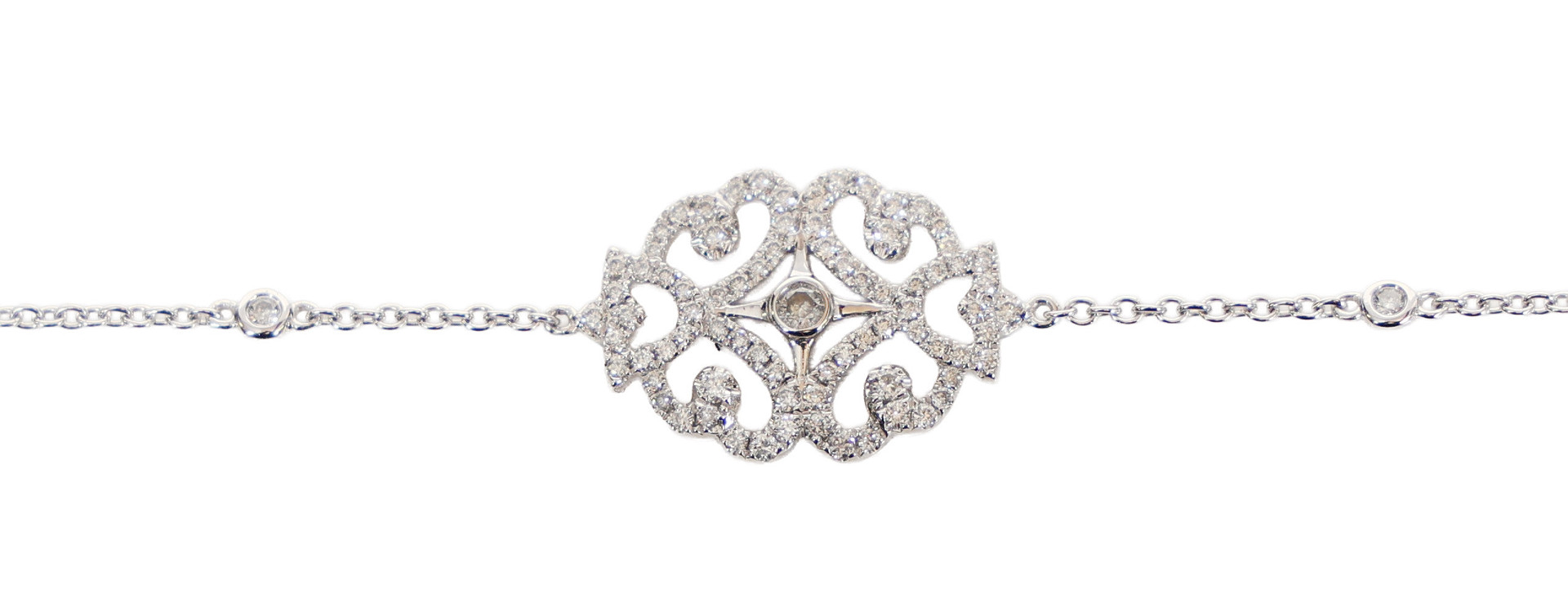 A MESSIKA 18 CARAT WHITE GOLD AND DIAMOND BRACELET.