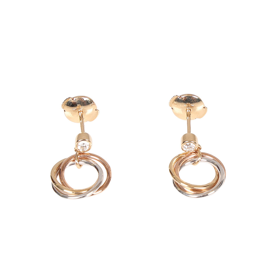 A PAIR OF CARTIER 18 CARAT GOLD DIAMOND SET TRINITY EARRINGS.