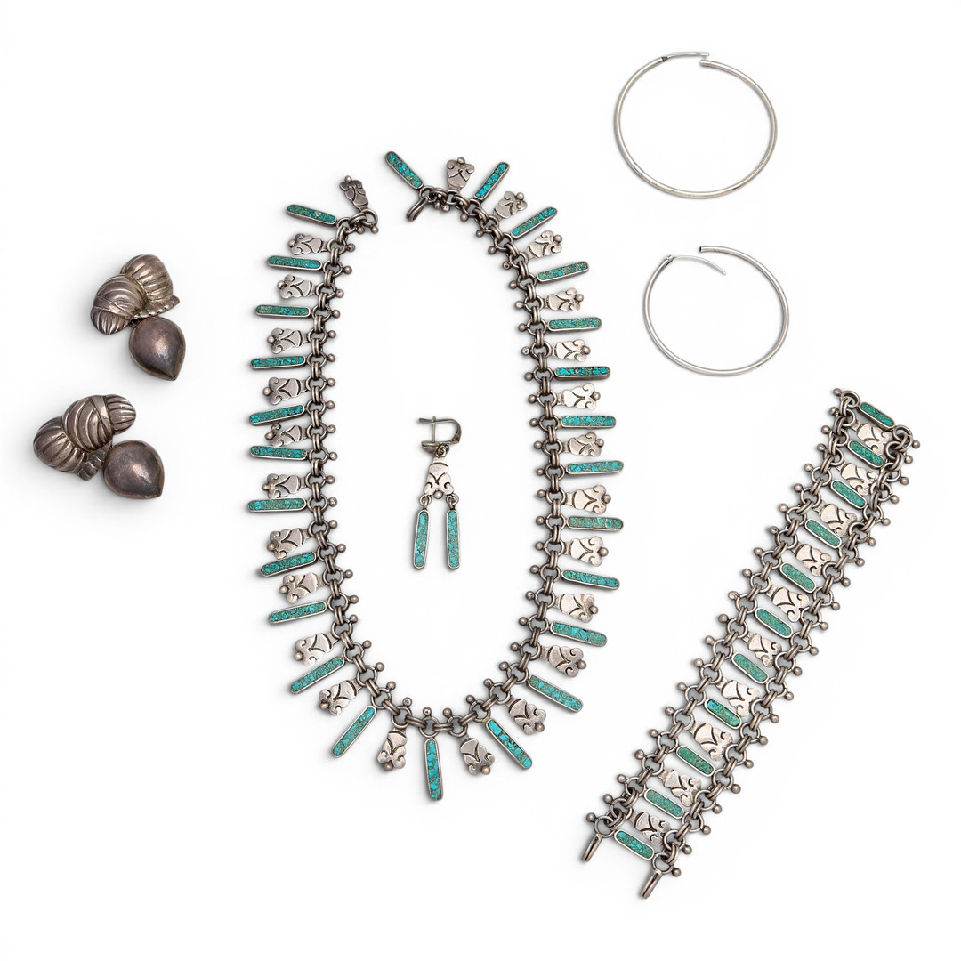 Hoop earrings, earrings, and a set comprising a bracelet, one earring and a necklace in silver, 20th Century.