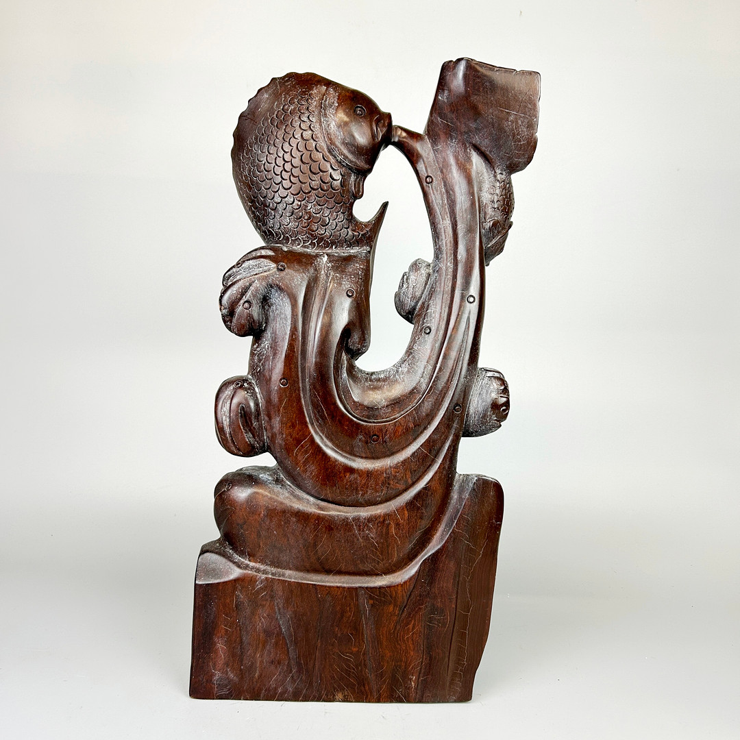 WOODEN FISH SCULPTURE.