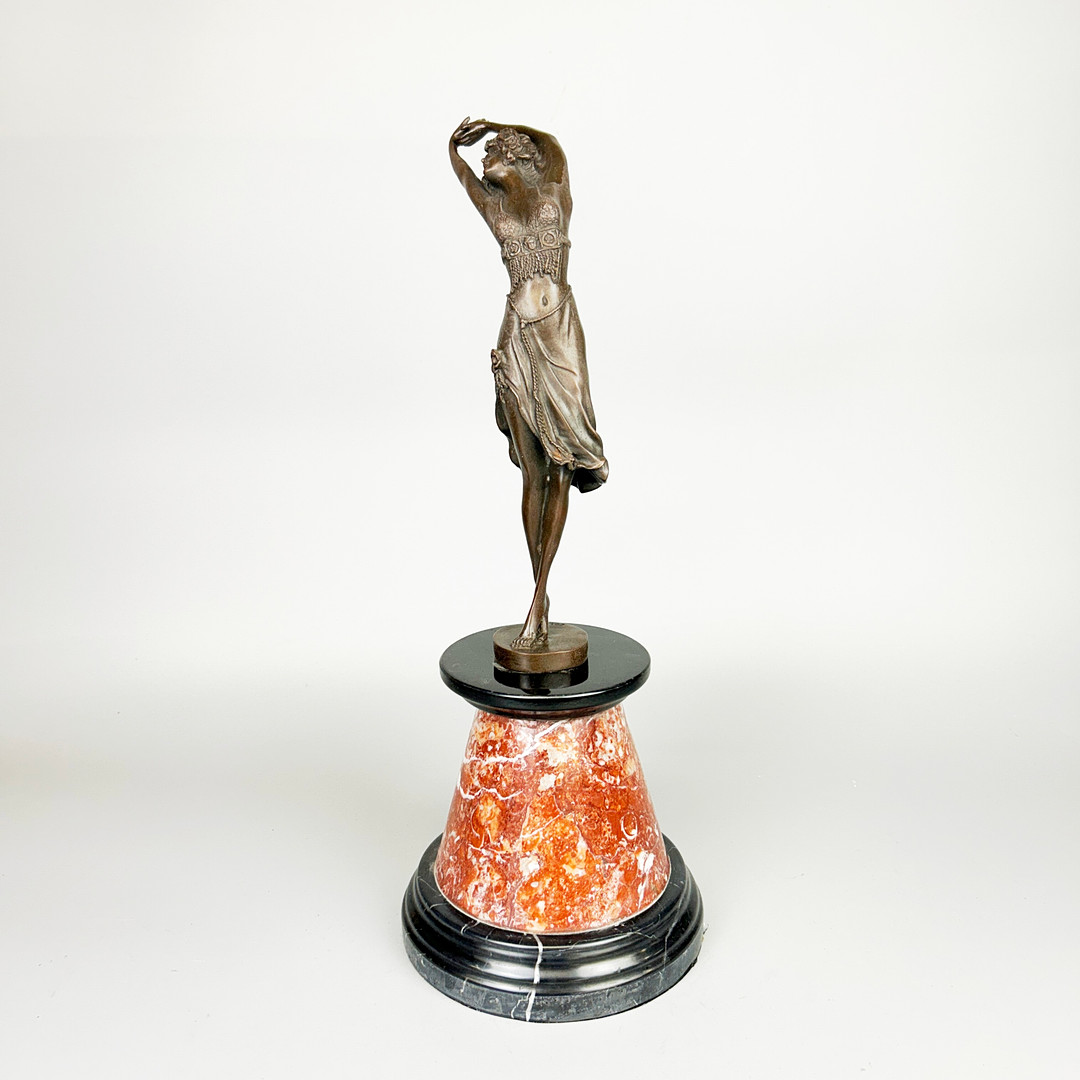 BRONZE DANCING GIRL.