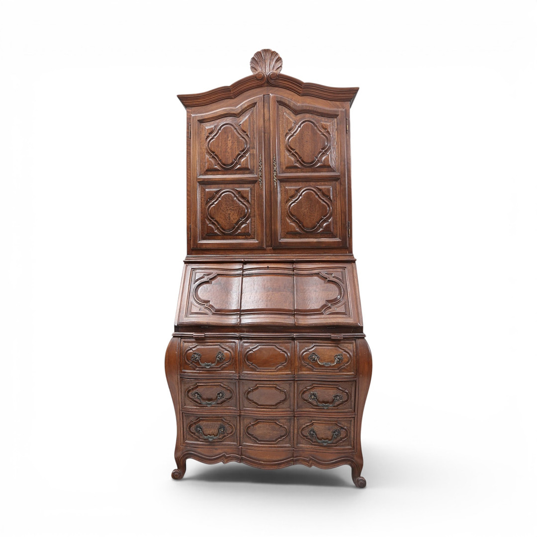 18th-century style walnut carved desk-bookcase, 20th century.
