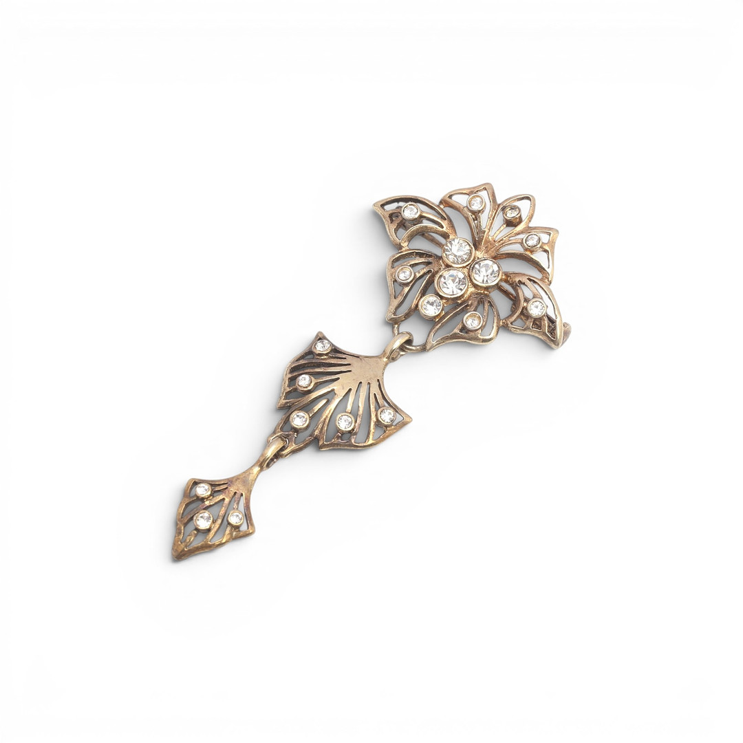 Articulated silver brooch, Modernist style.
