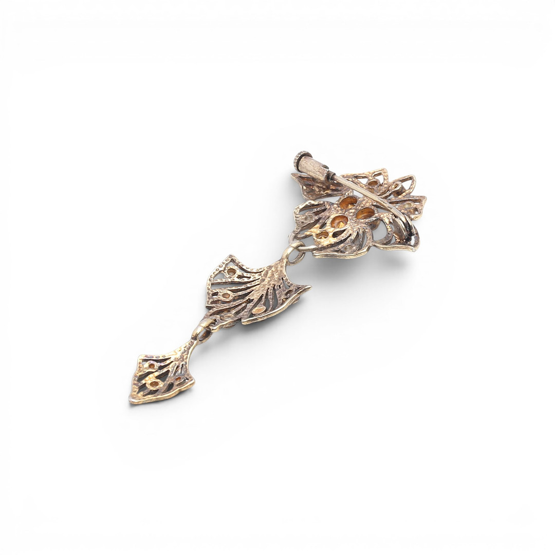 Articulated silver brooch, Modernist style.