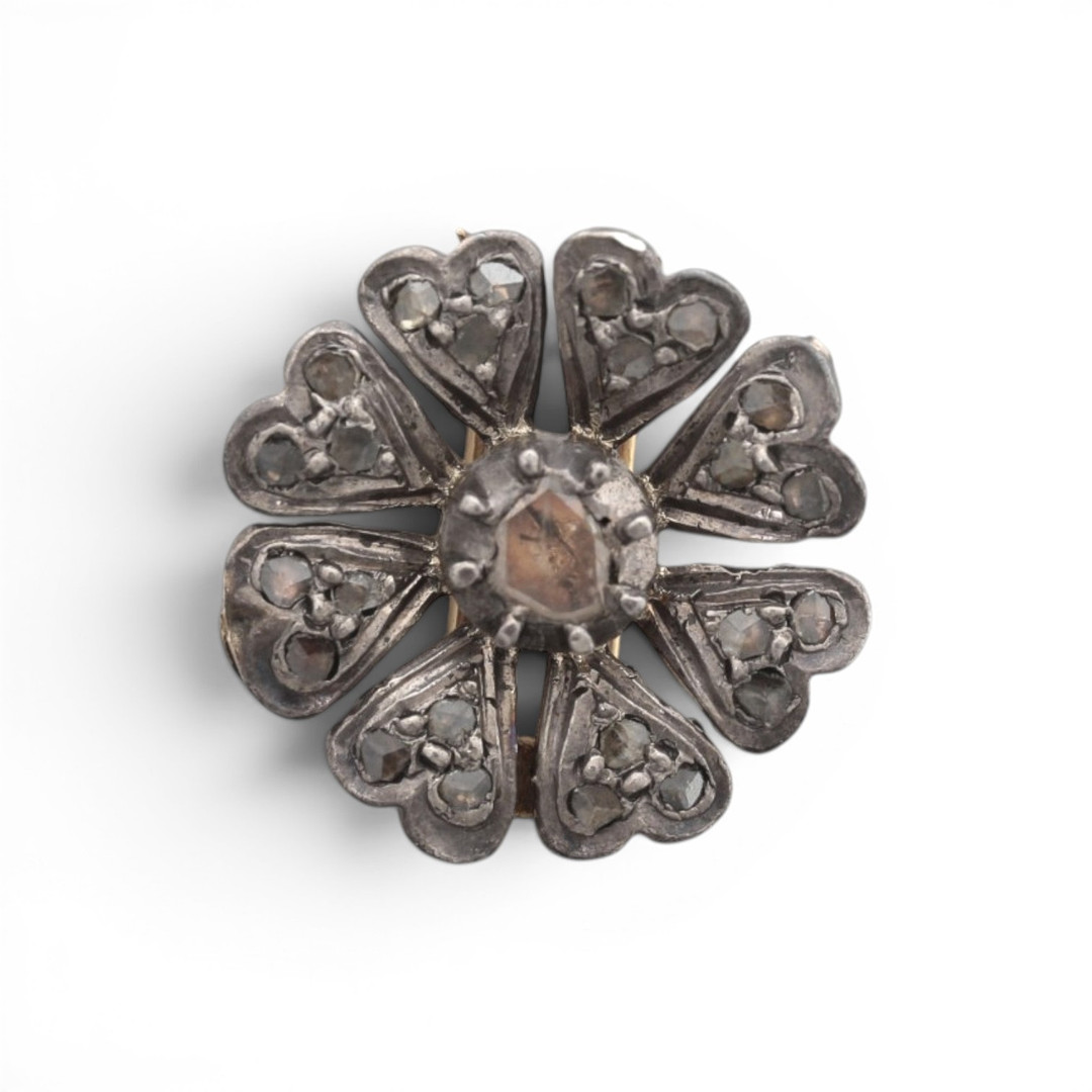 Pair of diamonds floral clip-brooches, late 19th Century.