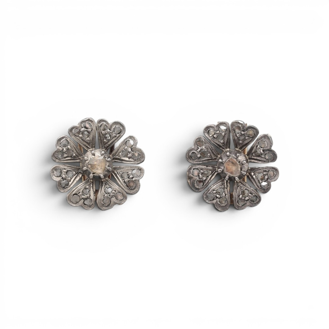 Pair of diamonds floral clip-brooches, late 19th Century.