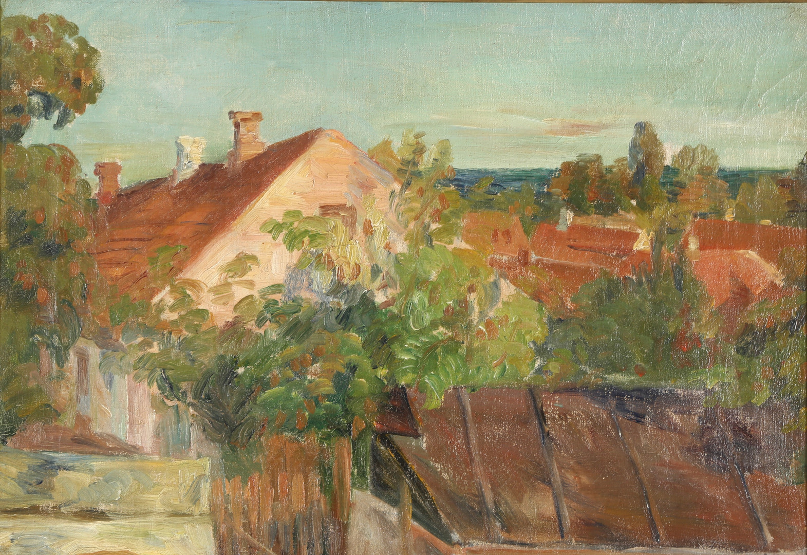 KRESTEN IVERSEN (1886-1955). byparti med hustage, olie på lærred.