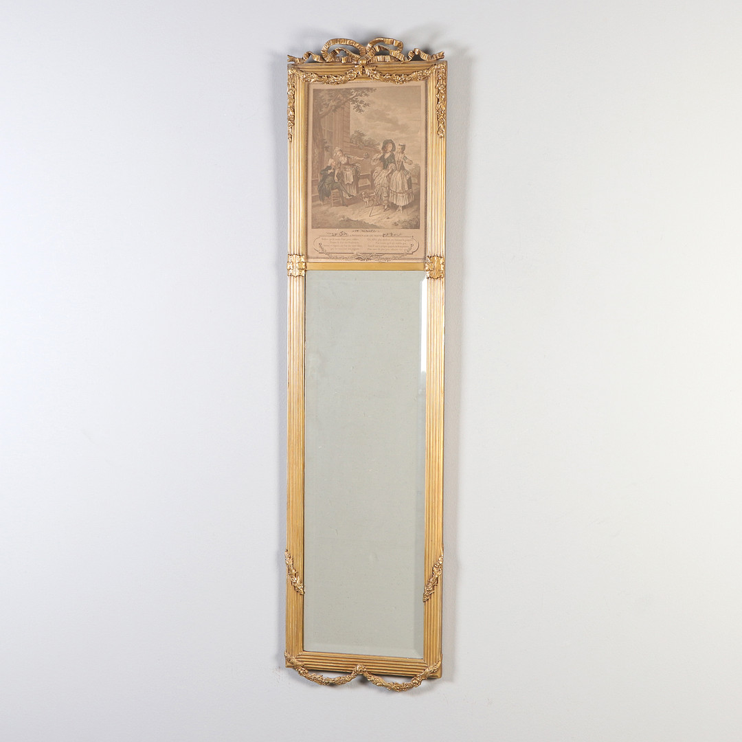 SPEGEL. Bronserad, med facettslipat glas, krön med grafiskt blad. Gustaviansk stil, 1900-talets första hälft.