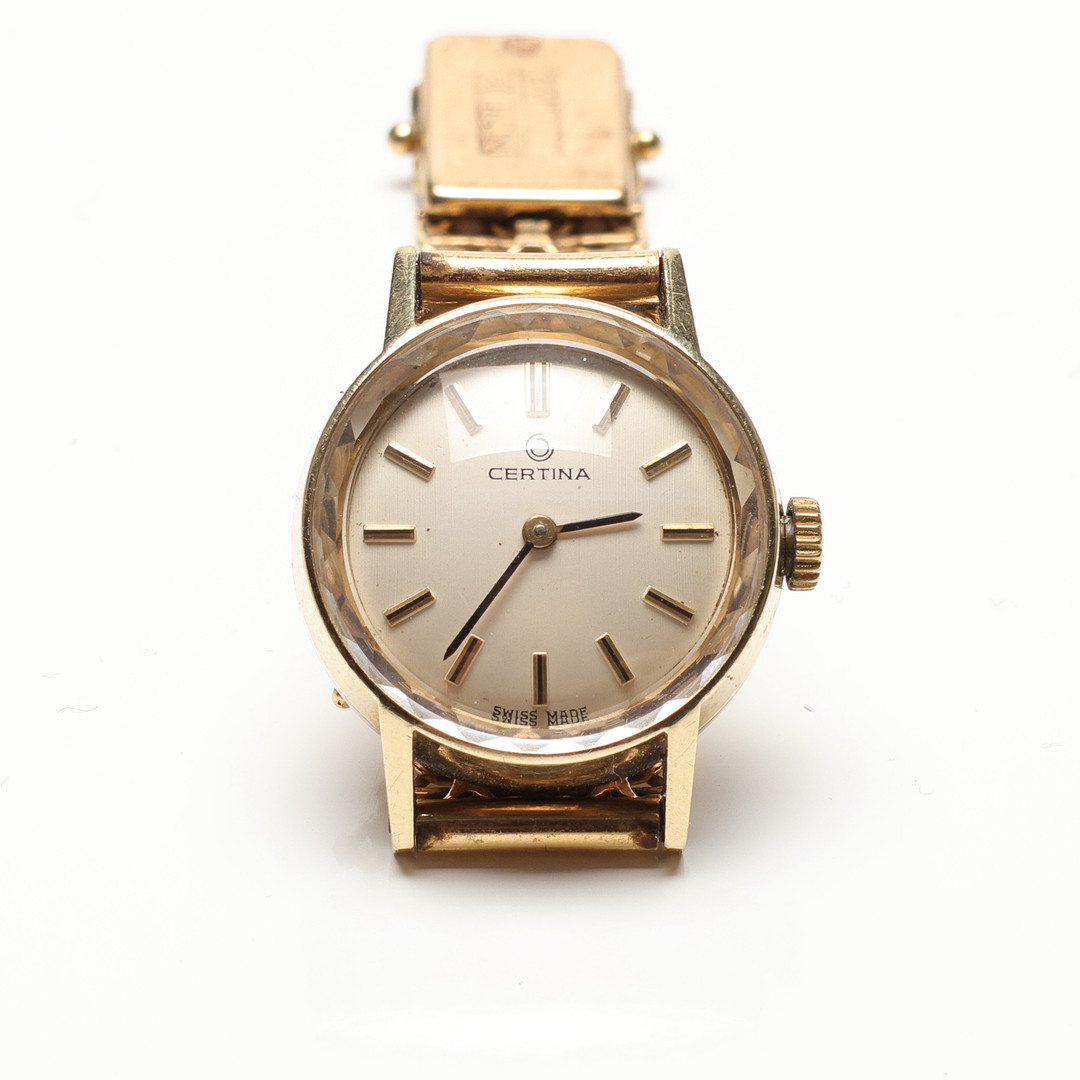 DAMARMBANDSUR, manuell, 14/18K guld. totalvikt ca 28 gram.