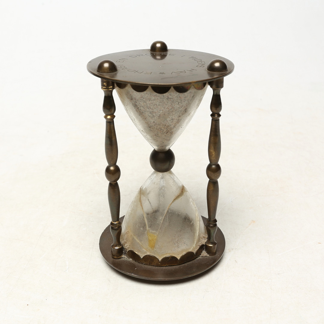 TIMGLAS, metall/glas "ENDAST EN DROPPE I TIDENS HAV" 1900-tal.