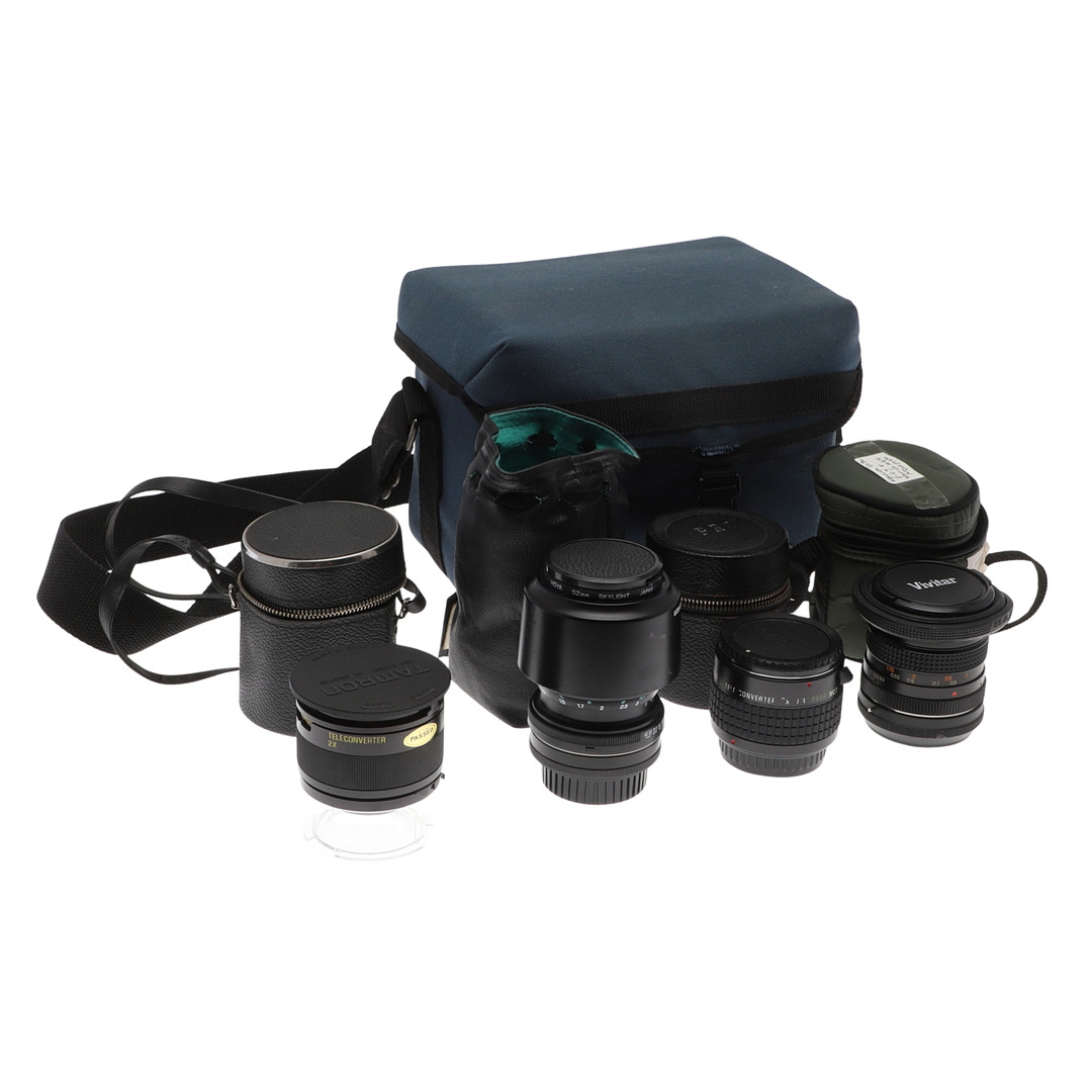 TWO CAMERA LENSES AND TWO TELECONVERTERS.