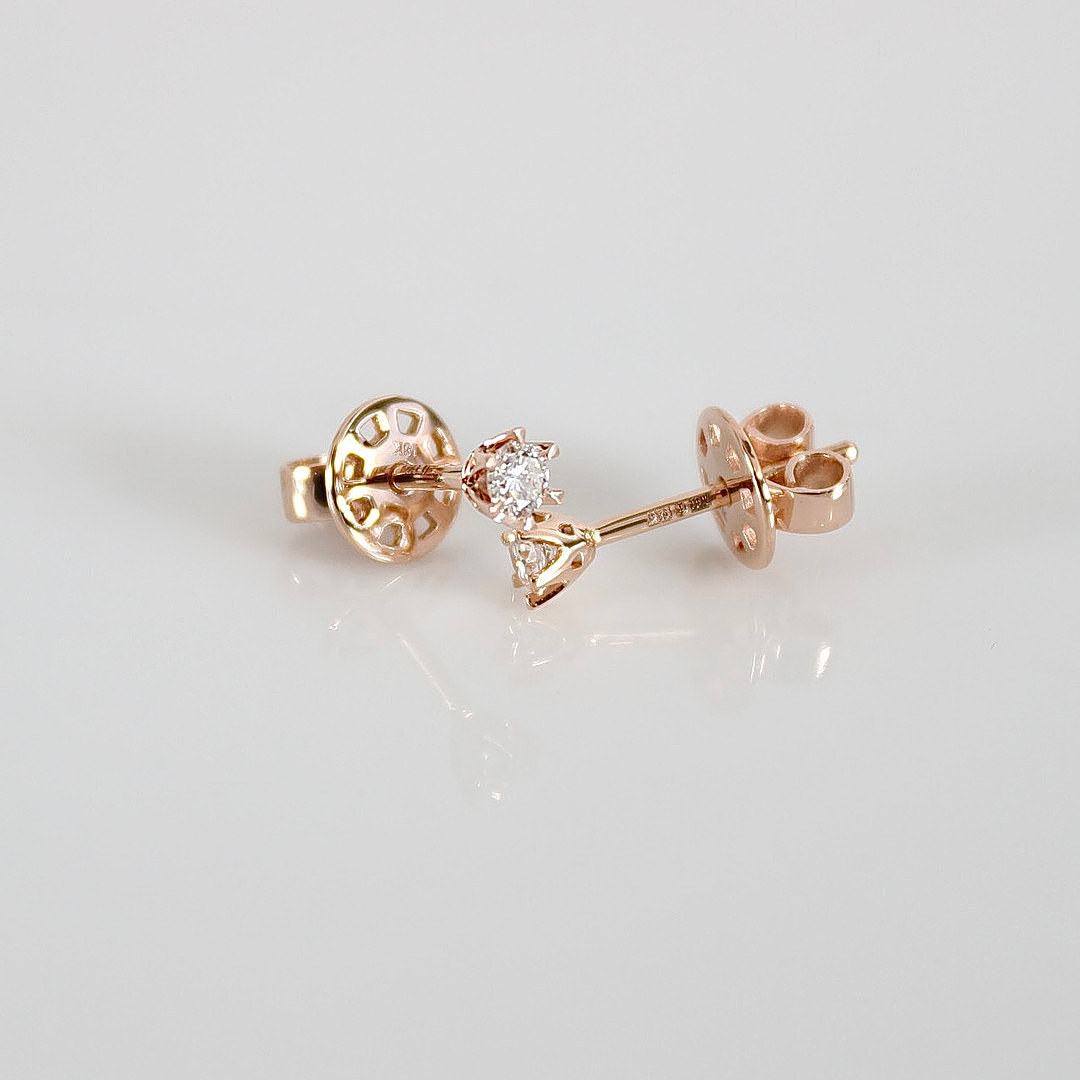 ENSTENSÖRHÄNGEN, 0,17ct, roséguld 18K.