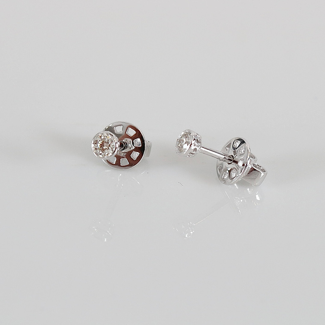 ENSTENSÖRHÄNGEN, 0,16ct, vitguld 18K.