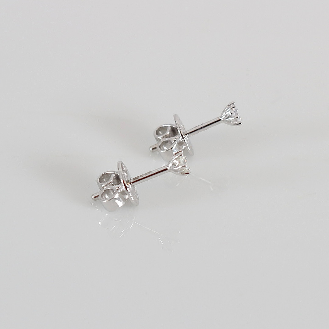 ENSTENSÖRHÄNGEN, 0,16ct, vitguld 18K.