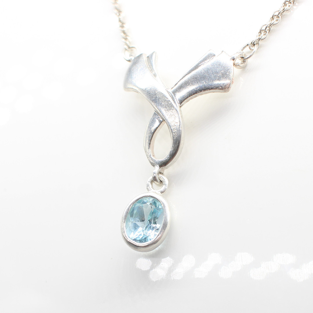 SILVER & BLUE STONE NECKLACE.