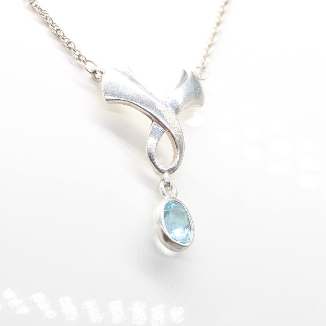 SILVER & BLUE STONE NECKLACE.