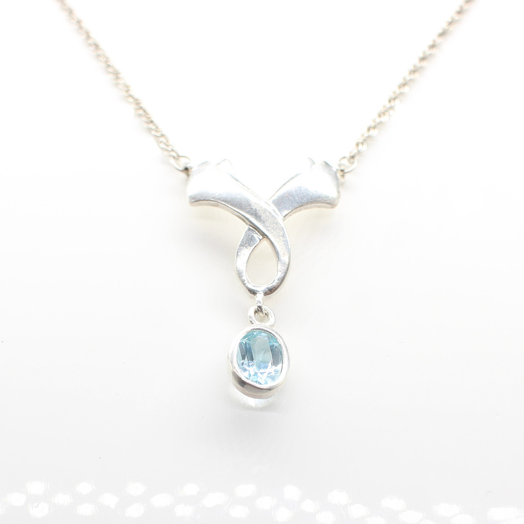SILVER & BLUE STONE NECKLACE.
