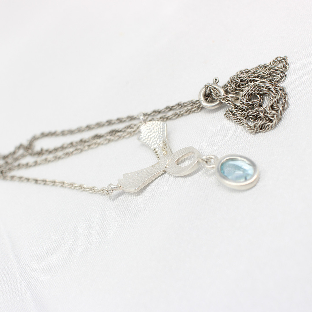 SILVER & BLUE STONE NECKLACE.